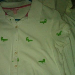 White Polo button down. With green alligators.